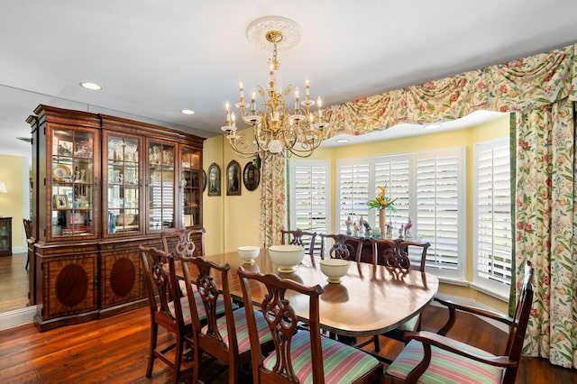 4633 Holly Dr, Palm Beach Gardens, FL 33418 - dining room with wood finished floors, a chandelier, baseboards, and recessed lighting