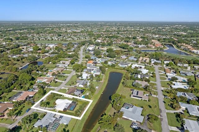 4633 Holly Dr, Palm Beach Gardens, FL 33418 - aerial view of property's location with a large body of water, nearby suburban area, and property parcel outlined