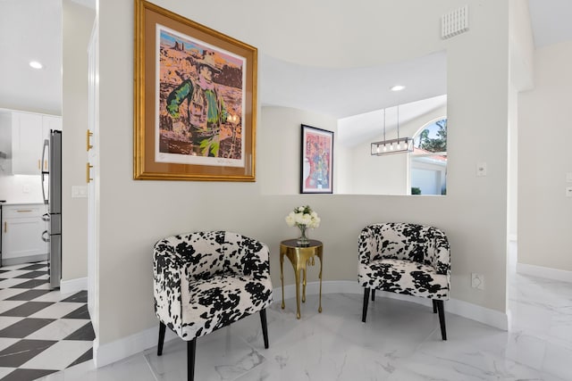 4902 SW Bimini Cir N, Palm City, FL 34990 - living area with recessed lighting, light marble finish flooring, and a chandelier