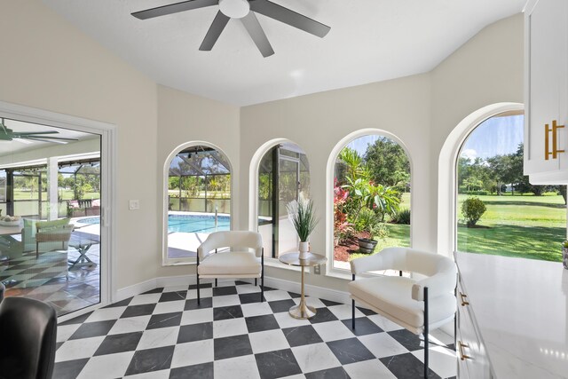 4902 SW Bimini Cir N, Palm City, FL 34990 - living area featuring ceiling fan and dark flooring