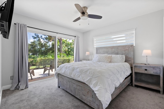 4902 SW Bimini Cir N, Palm City, FL 34990 - carpeted bedroom with access to exterior and a ceiling fan