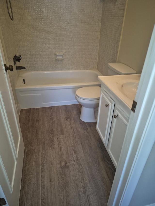 9253 SW 5th St Unit C, Boca Raton, FL 33428 - bathroom featuring wood finished floors, toilet, vanity, and bathing tub / shower combination