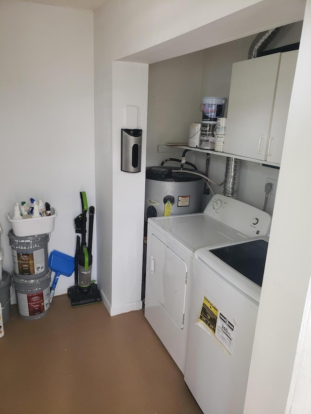 9253 SW 5th St Unit C, Boca Raton, FL 33428 - washroom with electric water heater, washing machine and clothes dryer, and cabinet space