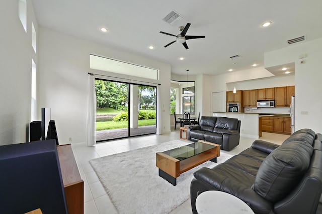 3583 Collonade Dr, Wellington, FL 33449 - living area featuring recessed lighting, ceiling fan, light tile patterned floors, and baseboards