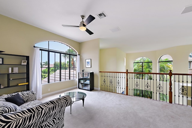 3583 Collonade Dr, Wellington, FL 33449 - sitting room featuring a ceiling fan, carpet, and baseboards