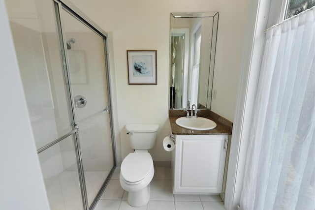 3583 Collonade Dr, Wellington, FL 33449 - bathroom featuring toilet, a shower stall, vanity, and tile patterned flooring