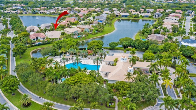 3583 Collonade Dr, Wellington, FL 33449 - aerial view of property and surrounding area featuring nearby suburban area, a large body of water, and a pool