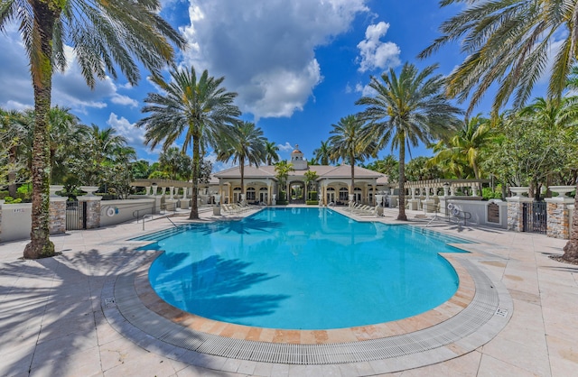 3583 Collonade Dr, Wellington, FL 33449 - community pool featuring a patio