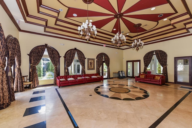 3583 Collonade Dr, Wellington, FL 33449 - building lobby featuring crown molding, a towering ceiling, and recessed lighting