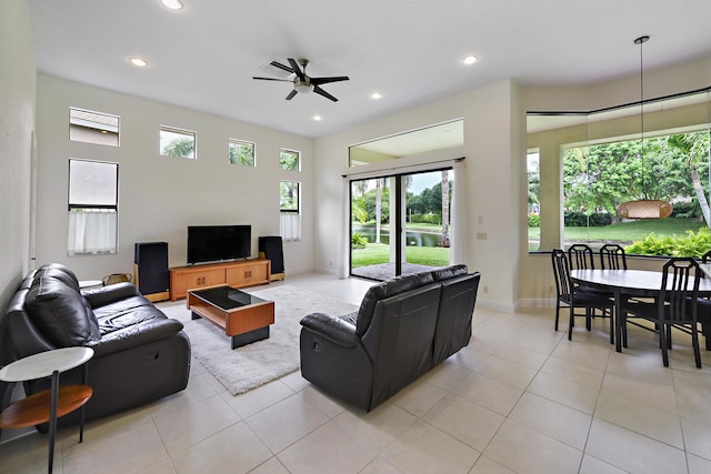 3583 Collonade Dr, Wellington, FL 33449 - living area with ceiling fan, healthy amount of natural light, recessed lighting, and light tile patterned floors