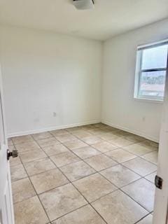 1260 Dr Martin Luther King Jr Blvd, Riviera Beach, FL 33404 - unfurnished room featuring light tile patterned floors and baseboards