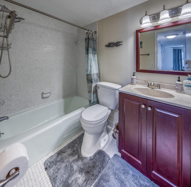 1516 S Lakeside Dr Unit 205, Lake Worth Beach, FL 33460 - full bathroom featuring shower / bath combination with curtain, tile patterned floors, vanity, and a textured ceiling