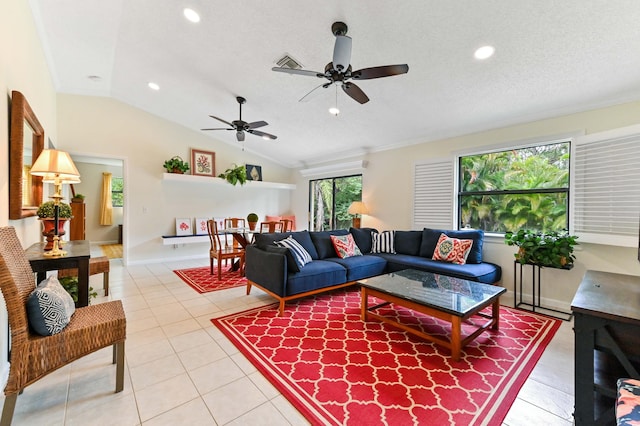 17183 76th St N, Loxahatchee, FL 33470 - living area with a ceiling fan, vaulted ceiling, light tile patterned flooring, recessed lighting, and a textured ceiling