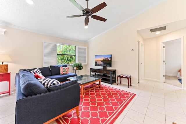 17183 76th St N, Loxahatchee, FL 33470 - living area featuring vaulted ceiling, light tile patterned floors, ornamental molding, ceiling fan, and baseboards