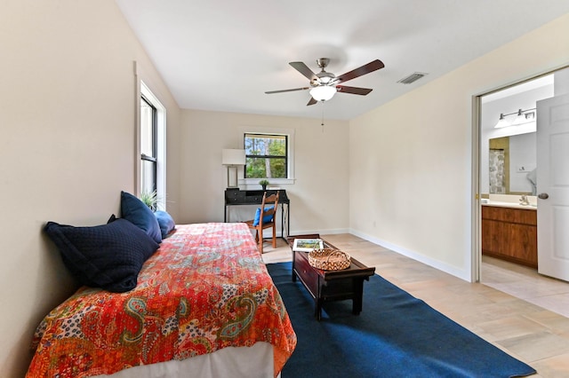 17183 76th St N, Loxahatchee, FL 33470 - bedroom featuring baseboards, a sink, ensuite bath, and ceiling fan