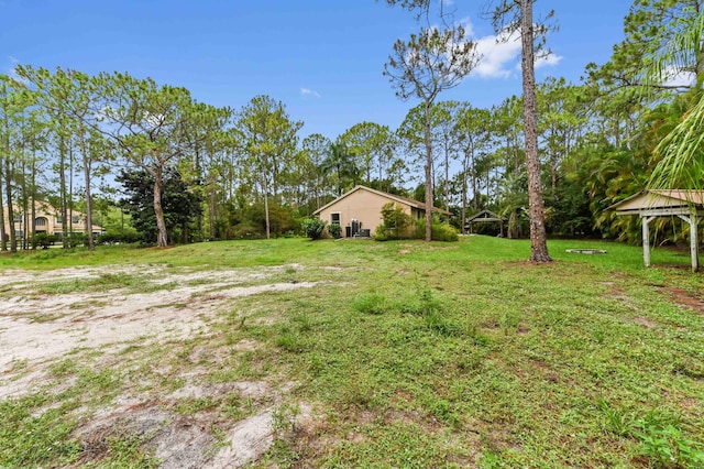 17183 76th St N, Loxahatchee, FL 33470 - view of green lawn featuring a gazebo