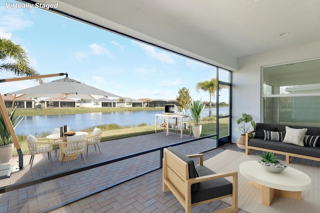 13439 SW River Rock Rd, Port Saint Lucie, FL 34987 - sunroom featuring a water view, outdoor lounge area, and a residential view