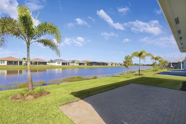 13439 SW River Rock Rd, Port Saint Lucie, FL 34987 - view of patio / terrace with a water view and a residential view