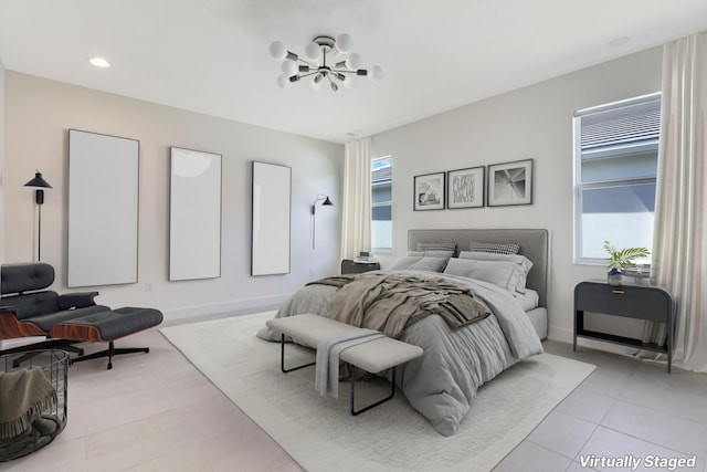 13439 SW River Rock Rd, Port Saint Lucie, FL 34987 - bedroom with multiple windows and light tile patterned flooring