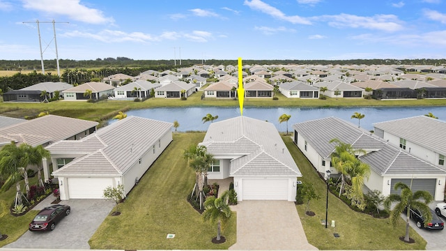 13439 SW River Rock Rd, Port Saint Lucie, FL 34987 - aerial perspective of suburban area with a large body of water