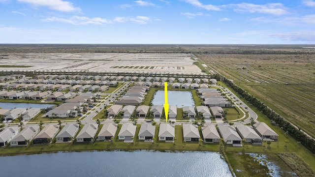 13439 SW River Rock Rd, Port Saint Lucie, FL 34987 - aerial perspective of suburban area with a nearby body of water