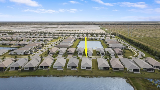 13439 SW River Rock Rd, Port Saint Lucie, FL 34987 - aerial perspective of suburban area with a nearby body of water