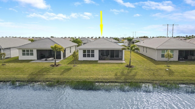 13439 SW River Rock Rd, Port Saint Lucie, FL 34987 - rear view of property with a sunroom, a water view, a lawn, and a residential view
