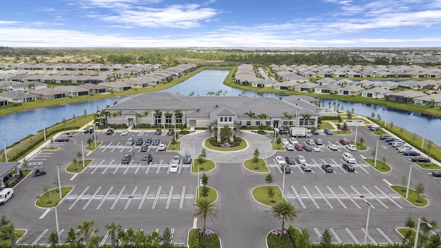 13439 SW River Rock Rd, Port Saint Lucie, FL 34987 - aerial view of residential area featuring a large body of water