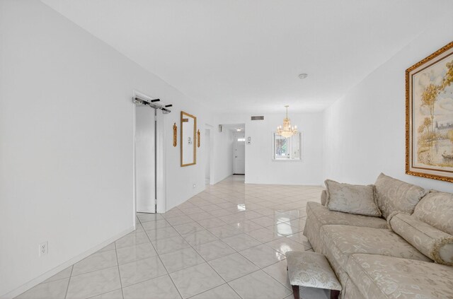 300 NE 20th St Unit 8060, Boca Raton, FL 33431 - living area featuring light tile patterned floors and a chandelier