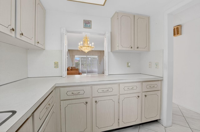 300 NE 20th St Unit 8060, Boca Raton, FL 33431 - kitchen featuring light countertops, a chandelier, decorative backsplash, and light tile patterned floors