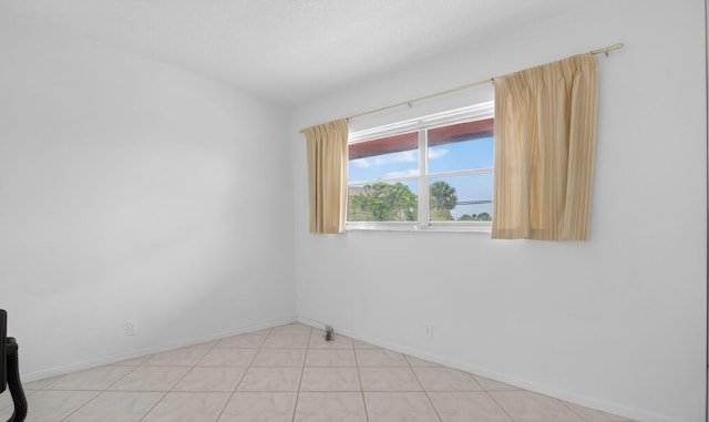 300 NE 20th St Unit 8060, Boca Raton, FL 33431 - spare room featuring baseboards