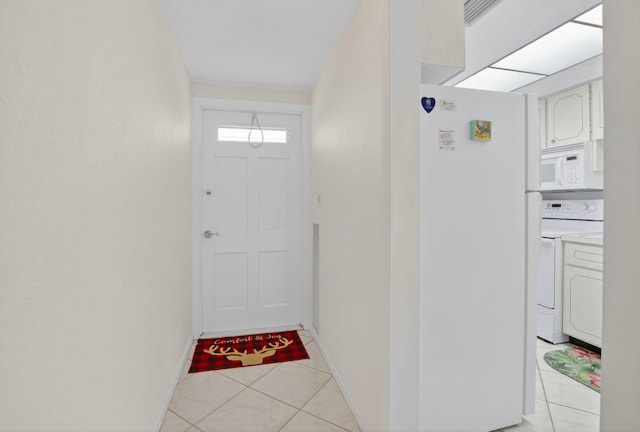 300 NE 20th St Unit 8060, Boca Raton, FL 33431 - doorway to outside with light tile patterned floors and baseboards