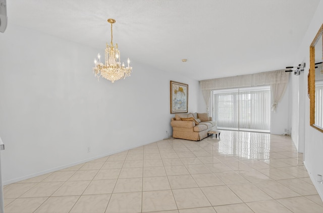 300 NE 20th St Unit 8060, Boca Raton, FL 33431 - spare room featuring a chandelier and light tile patterned flooring