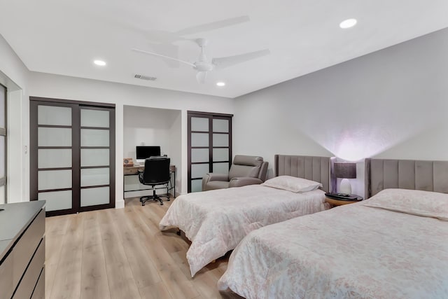 21695 Tall Palm Cir Unit 4B, Boca Raton, FL 33433 - bedroom with an office area, light wood-type flooring, recessed lighting, and a ceiling fan
