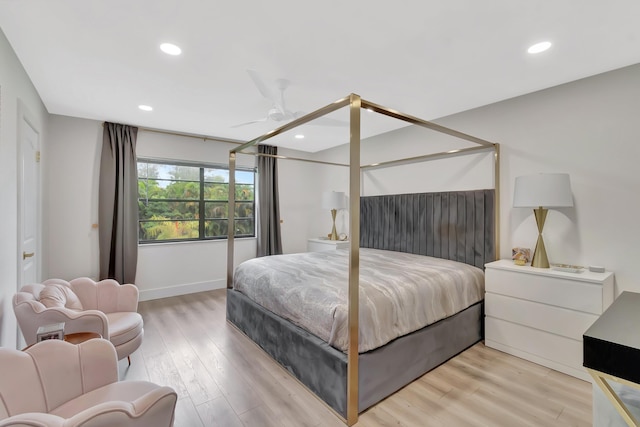 21695 Tall Palm Cir Unit 4B, Boca Raton, FL 33433 - bedroom featuring light wood-style flooring, recessed lighting, a ceiling fan, and baseboards