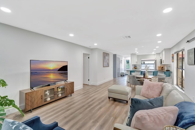 21695 Tall Palm Cir Unit 4B, Boca Raton, FL 33433 - living area featuring recessed lighting, light wood-style floors, and baseboards