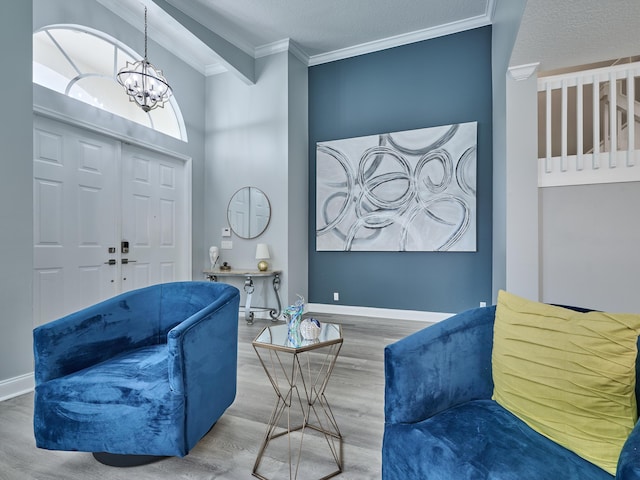 8194 Via Bolzano, Lake Worth, FL 33467 - living area featuring ornamental molding, wood finished floors, a chandelier, and baseboards