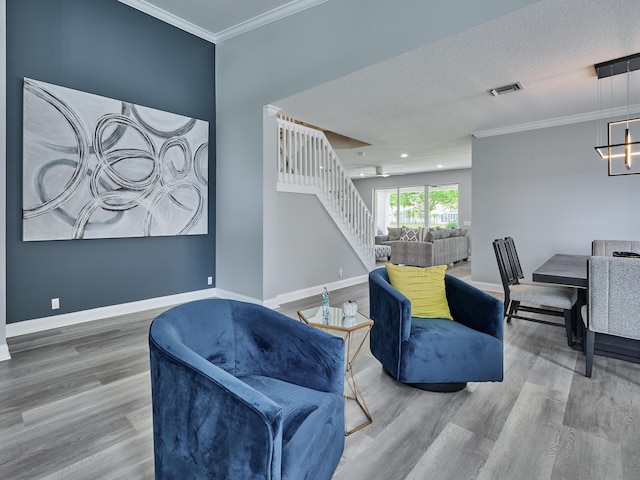 8194 Via Bolzano, Lake Worth, FL 33467 - living area with stairs, wood finished floors, ornamental molding, baseboards, and a chandelier