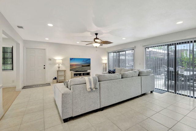 146 Weybridge Cir Unit B, Royal Palm Beach, FL 33411 - living area with recessed lighting, light tile patterned floors, ceiling fan, and baseboards