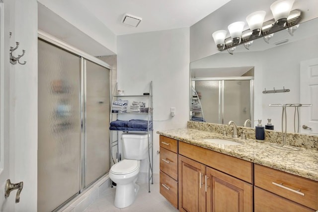 146 Weybridge Cir Unit B, Royal Palm Beach, FL 33411 - bathroom featuring vanity, toilet, a stall shower, and tile patterned flooring