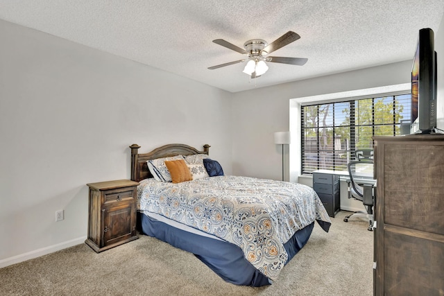 146 Weybridge Cir Unit B, Royal Palm Beach, FL 33411 - bedroom featuring light colored carpet, baseboards, a textured ceiling, ceiling fan, and an office area