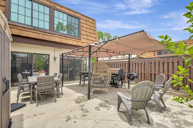 146 Weybridge Cir Unit B, Royal Palm Beach, FL 33411 - view of patio featuring outdoor dining space and a grill