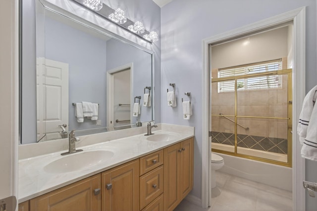 19050 SE Kokomo Ln, Jupiter, FL 33458 - full bathroom featuring double vanity, combined bath / shower with glass door, and tile patterned floors