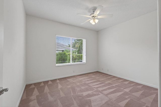19050 SE Kokomo Ln, Jupiter, FL 33458 - spare room with light colored carpet and a ceiling fan