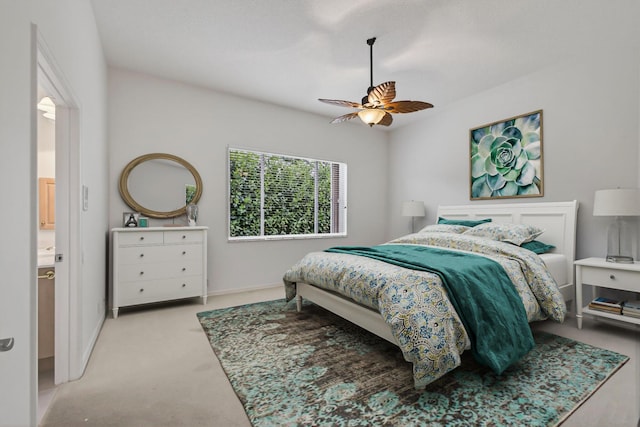19050 SE Kokomo Ln, Jupiter, FL 33458 - bedroom with light carpet and a ceiling fan