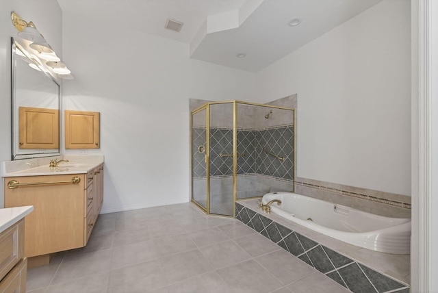 19050 SE Kokomo Ln, Jupiter, FL 33458 - full bathroom with vanity, a stall shower, a whirlpool tub, and tile patterned flooring