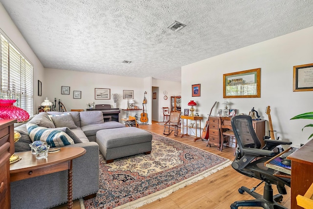 9494 SE Cove Point St, Jupiter, FL 33469 - living area with wood finished floors and a textured ceiling