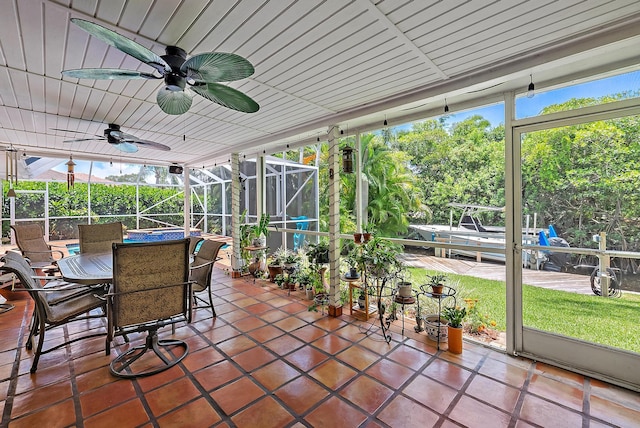 9494 SE Cove Point St, Jupiter, FL 33469 - sunroom / solarium featuring ceiling fan and outdoor dining space