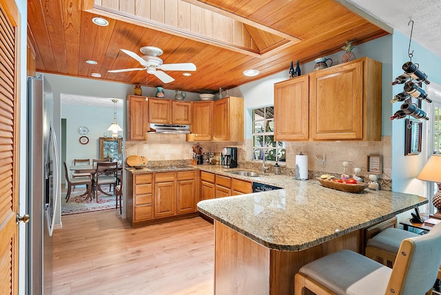 9494 SE Cove Point St, Jupiter, FL 33469 - kitchen featuring wooden ceiling, extractor fan, stainless steel fridge, a peninsula, and ceiling fan