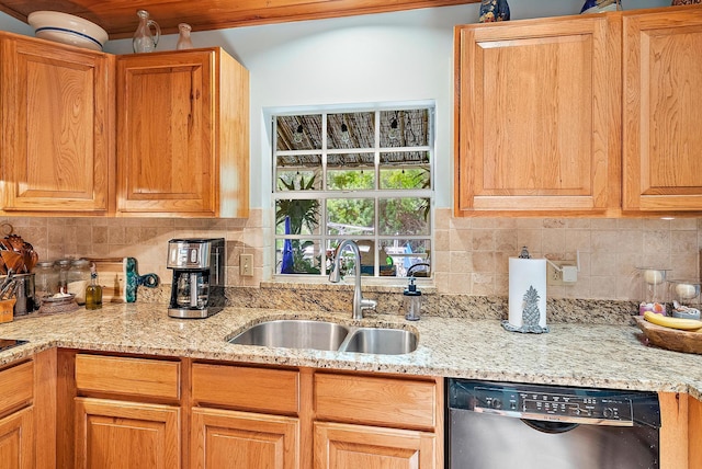 9494 SE Cove Point St, Jupiter, FL 33469 - kitchen with stainless steel dishwasher, backsplash, and light stone countertops